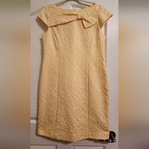 Beautiful classic retro pinup looking yellow dress